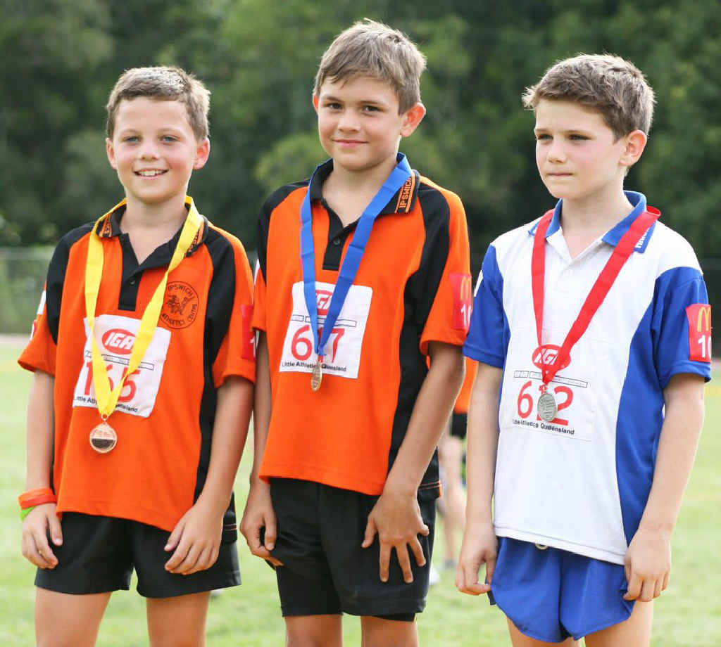 FINE DUO: Ipswich under-10 boys 60m hurdling medallists Kaleb McKeown (third) and winner Kyle Colburn, with another competitor. FINE DUO: Ipswich under-10 boys 60m hurdling medallists Kaleb McKeown (third) and winner Kyle Colburn, with another competitor.